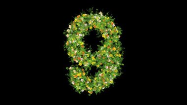 9 numara çimenli ve renkli çiçeklerle sade siyah sırt çantalı.