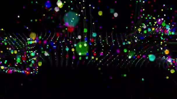 普通黑色背景上迷人的彩色假粒子 — 图库视频影像