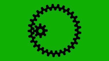 Yeşil ekran arka planına sahip büyük bir dişlinin içinde küçük dönen