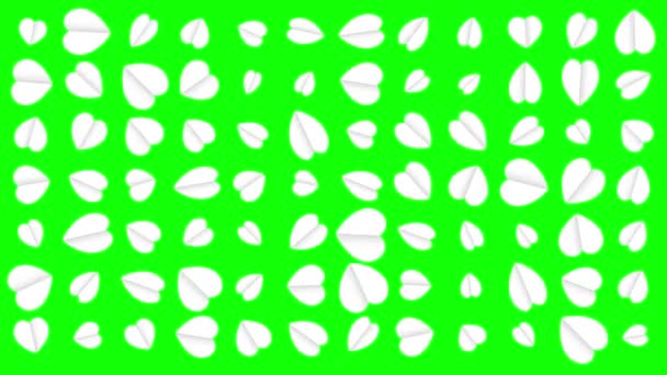 緑のスクリーンの背景の白いペーパー ハートの不規則なパターン — ストック動画