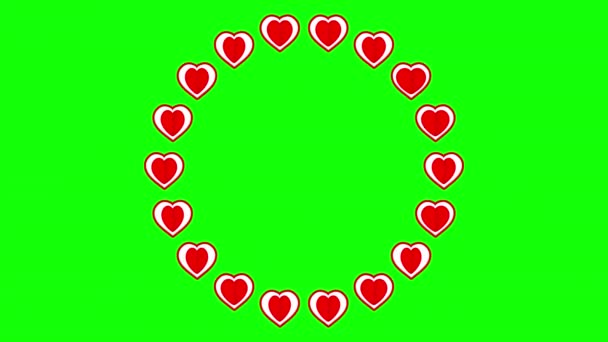 緑色の背景の円形パターンの赤いハート — ストック動画