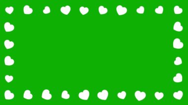 Beyaz kalp yeşil ekran arkaplanındaki dekoratif çerçeveyi şekillendirir
