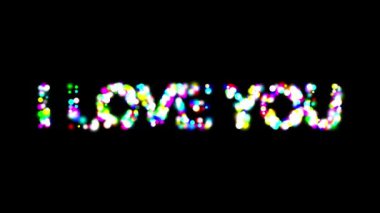 I Love You metin with color bokeh lights on plain black background