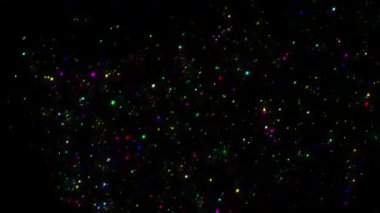 Renkli parıltı düz siyah arkaplan ile hareket grafikleri parlıyor