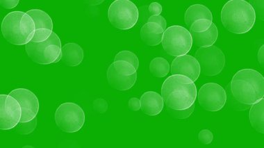Yeşil ekran arkaplanlı beyaz bokeh ışıkları hareket grafikleri
