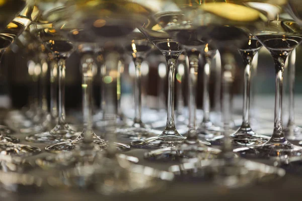 Glasses with white and red wine. Catering services. Glasses with wine in row background at restaurant party. Shallow dof.