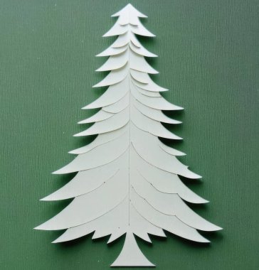 Kağıttan kesilmiş Noel ağacı. Tebrik kartları ve tasarım için resim.