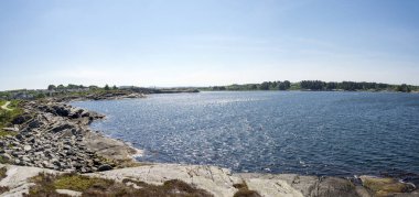 Panoramic view of rocky coastline in Kvernevik suburb, Stavanger, Norway, May 2018