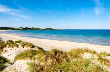 A view to Sola beach from the grass covered sand dunes, Stavanger, Norway, May 2018