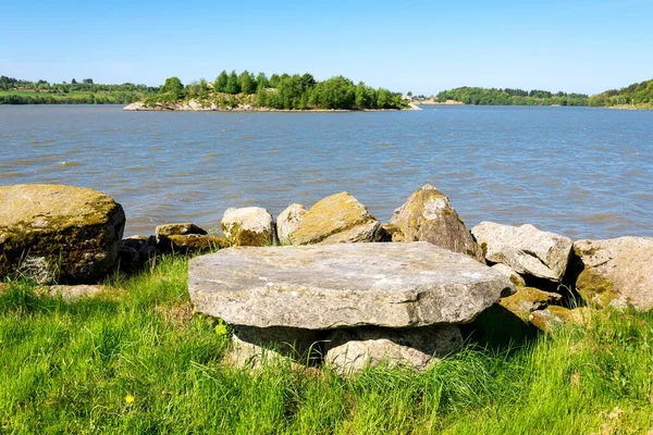 A solid stone table at the shore of Halandsvatnet lake, Stavanger, Norway, May 2018