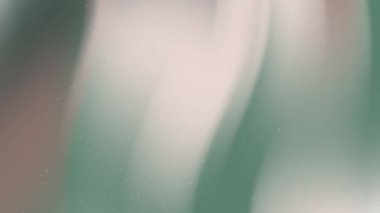 Yumuşak yeşil ve bej benekli bulanık arkaplan, doğal temalı tasarımlar, soyut kavramlar veya web siteleri için yatıştırıcı duvar kağıdı için ideal.