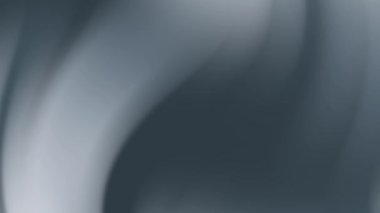 Gri ve beyaz gradyanlı yumuşak soyut arkaplan. Sunumlar, web tasarımı, sosyal medya paylaşımları ve markalaşma projeleri için elverişli.