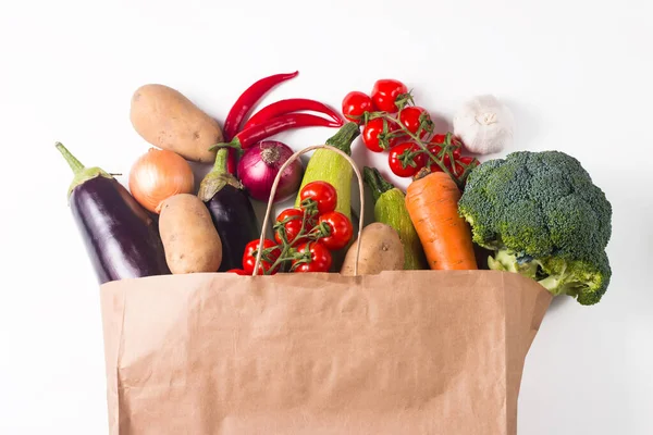 Delivery healthy food background. Healthy organic food in paper bag with vegetables. Zero waste concept.