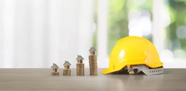 Yellow Hardhat Model House Coin Trading Graph Financial Investment Concept — Stock Photo, Image
