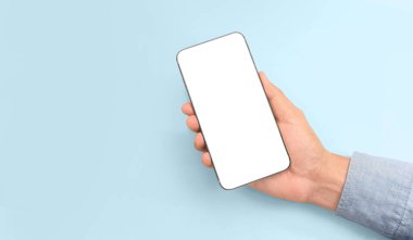 Hand holding smartphone device touching screen