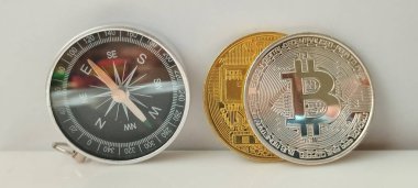 Modern finans dijital manzarasında geleceğin kripto para birimini ve pusula sembolizmini yönlendiriyor.