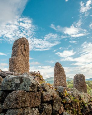 Prehistoric standing stones or Menhirs at Filitosa in Corsica clipart