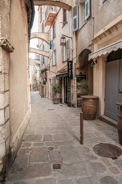 stock image Bonifacio, Corsica, France - 29th May 2024 - An empty narrow cobbled street in the citadel of Bonifacio on the Mediterranean island of Corsica