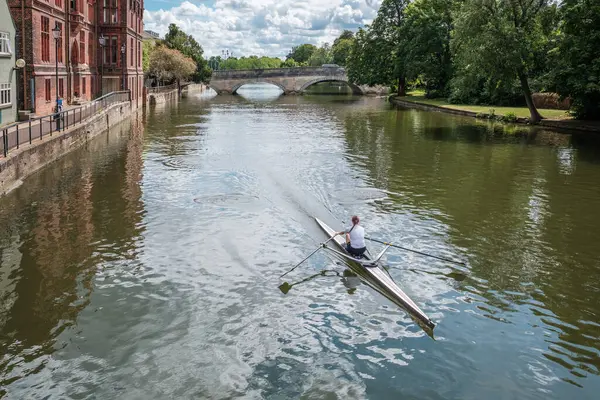 stock image Bedford, England - 8th July 2024: A rower training in a single scull on the river Great Ouse in the town of Bedford in Bedfordhire, England