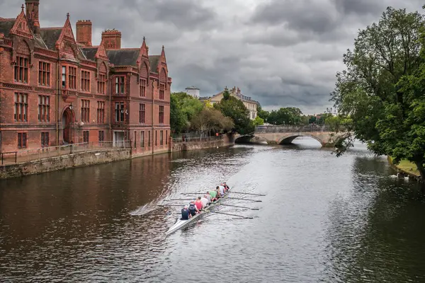 stock image Bedford, England - 9th July 2024: Rowers training in a coxed eight pass under the Riverside Bridge over the river Great Ouse in the town of Bedford in Bedfordhire, England