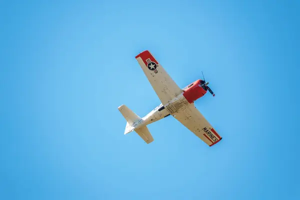 stock image Sarlat-Domme, Dordogne, France - 25th August 2024: A North American T-28B Trojan, registration F-AYVF, performs aerobatics at the Sarlat-Domme Spectacle Aerien airshow