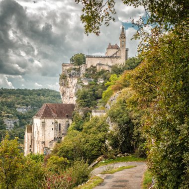 The Sanctuaire and Chateau standing on the cliffs above the sacred village of Rocamadour in the Lot region of France clipart