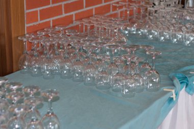 Empty glasses in restaurant. Cutlery on the table in a restaurant table setting photo