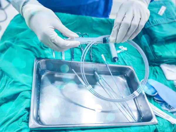 The nurse prepare guidewire for Medical material for surgical intervention packaging and sterile