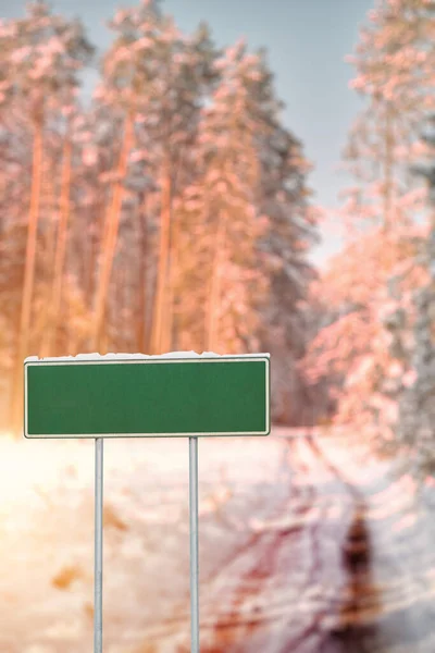 Empty road sign in winter
