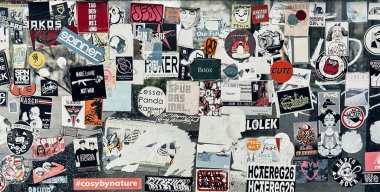 Hamburg, Germany, Europe 25.12.2022. The public transport stop on the street is covered with numerous multicolored stickers.