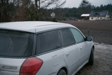Car covered snow, frozen back window vehicle winter