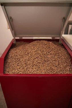 Pellet boiler system. Biomass heating systems generate heat from biomass. Renewable energy and sustainable future