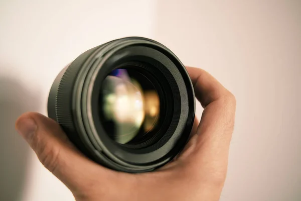 Modern Digital Camera Lens Hand Close Light Background Banner Image — Stock fotografie
