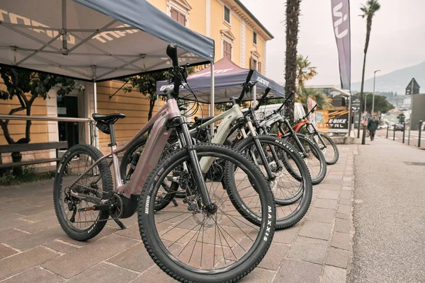 stock image 11.04.2023 Italy, Europe. Public electric bike parking station. Charging point for electric bicycles.