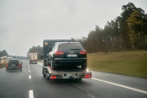 stock image 12.04.2023 Germany, Europe. Tow truck with on the road. Roadside assistance concept.