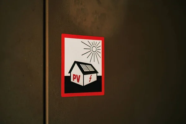 Photovoltaics sticker on a closed electric box.