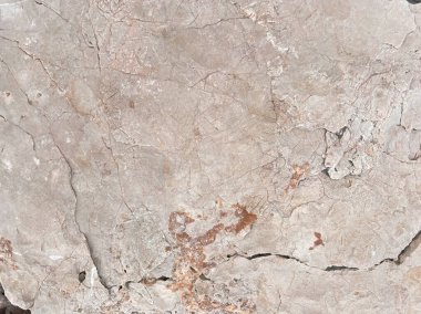 Islak Taş Deniz Sahil Arkaplanı dokusu. Kıyı şeridindeki Gri Taşların Huysuz ve Yıpranmış Dokusu