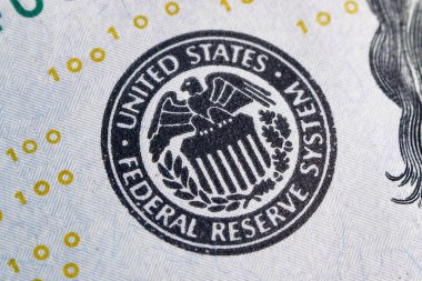 macro photo of federal reserve system symbol one hundred dollar bill USD. close-up with fine and sharp texture. shallow focus. clipart