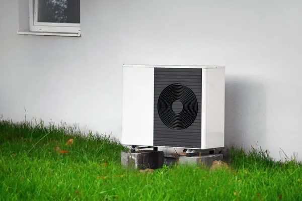Efficient Air Source Heat Pump: The Modern Solution for Home Heating and Hot Water. Sustainable future concept.