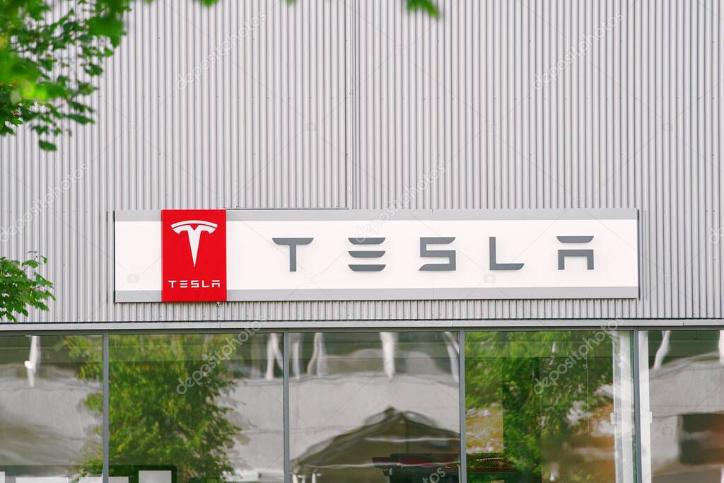 Europe, Norway 09.22.2023 Tesla logo sign on the building. Electrifying Norway with EVs. Leading the Green Automotive Revolution in Scandinavia