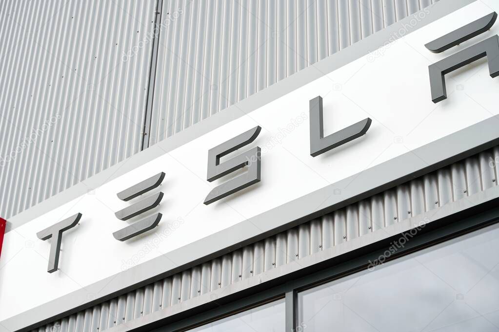 Europe, Norway 09.22.2023 Tesla logo sign on the building. Electrifying Norway with EVs. Leading the Green Automotive Revolution in Scandinavia