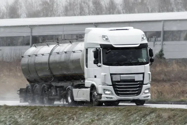 Tank Truck Transporting LPG Gas on a Highway: A Challenge and Beauty of Transportation Logistics