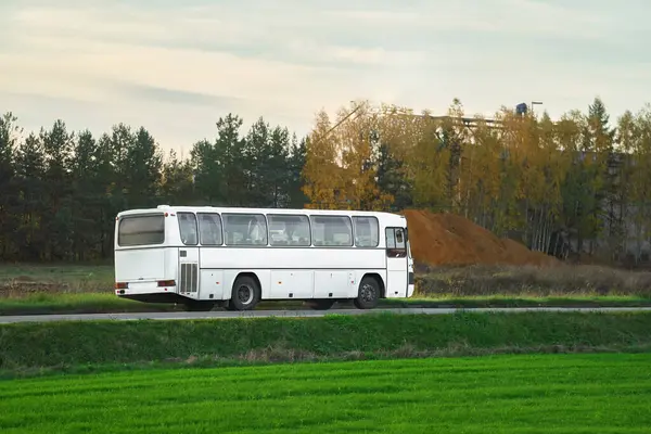 Travel in Comfort and Style with This Modern White Coach on the Road.