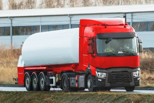 Tank Truck Transporting LPG Gas on a Highway: A Challenge and Beauty of Transportation Logistics