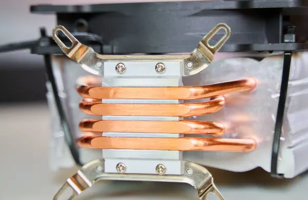 Close-up of an aluminum radiator with copper heat pipes isolated. Clean Copper Tubing Ready for Heat transfer.