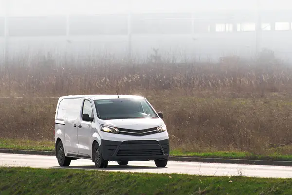 stock image Delivery Van Ensures Timely Arrival of Internet Orders