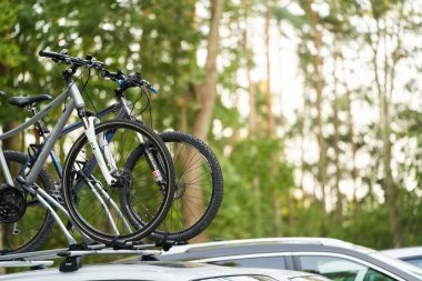 Europe, Poland, Gdansk - August 27, 2023 Car with Thule Bike Rack: Subaru Legacy Ready for a Cycling Adventure clipart