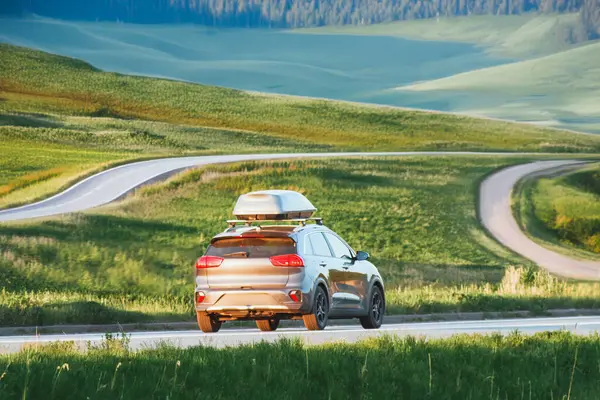 stock image Car with roofbox journey through countryside