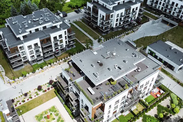 Stock image Aerial view of contemporary apartment complex with gardens