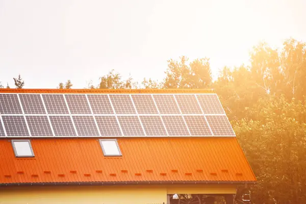 stock image Eco-friendly house with solar panels on sunny day